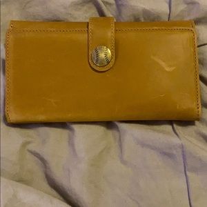 Baseballism tan glove leather wallet.